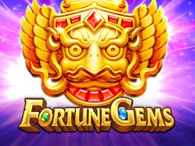 Fortune Gems slot artwork by JILI, showing the golden guardian mask